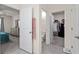 Hallway view leading to the main bedroom, en-suite bathroom, and walk-in closet at 32 Hickory Course Loop, Ocala, FL 34472