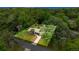 Beautiful aerial shot showcasing the home nestled among lush greenery, providing privacy and a serene setting at 3331 Se 4Th St, Ocala, FL 34471