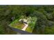 Beautiful aerial shot showcasing the home nestled among lush greenery, providing privacy and a serene setting at 3331 Se 4Th St, Ocala, FL 34471