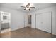 Bedroom featuring closet storage and an ensuite bathroom at 3331 Se 4Th St, Ocala, FL 34471