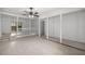 Spacious living room with access to a screened-in porch at 3331 Se 4Th St, Ocala, FL 34471