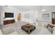 Open-concept living room offering a modern look with sleek furnishings and ample natural light at 3331 Se 4Th St, Ocala, FL 34471