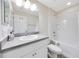Clean bathroom featuring a vanity, toilet, and a shower-tub combination for relaxation and convenience at 3418 Sw 155Th Pl, Ocala, FL 34473