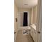 Bathroom features a shower-tub combo, single sink vanity and neutral tile flooring at 360 Marion Oaks Golf Way, Ocala, FL 34473