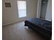 Simple bedroom with carpet, a built-in closet, and natural light from the window at 360 Marion Oaks Golf Way, Ocala, FL 34473