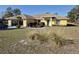 Inviting single-Gathering home featuring a manicured lawn and mature landscaping at 360 Marion Oaks Golf Way, Ocala, FL 34473