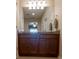 Bathroom vanity featuring dual sinks, dark cabinetry, and granite countertop at 3947 Nw 46Th Ter, Ocala, FL 34482