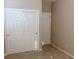 This cozy bedroom features a double door closet and a neutral color palette at 3947 Nw 46Th Ter, Ocala, FL 34482