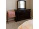 Spacious bedroom with dresser and carpet at 3947 Nw 46Th Ter, Ocala, FL 34482
