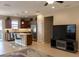 A shot of the kitchen, with stainless steel appliances, an island, and dark brown cabinetry at 3947 Nw 46Th Ter, Ocala, FL 34482