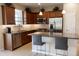 Bright kitchen features stainless steel appliances, granite countertops, and breakfast bar seating at 3947 Nw 46Th Ter, Ocala, FL 34482