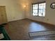 Spacious living room with large window offering natural light and ample space at 519 Spring Lake Rd, Ocala, FL 34472