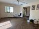 Inviting living room featuring tile flooring, window, and neutral color scheme at 519 Spring Lake Rd, Ocala, FL 34472