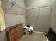 Spacious walk-in closet featuring white shelving and ample storage space for an organized wardrobe at 5255 Nw 33Rd Pl, Ocala, FL 34482