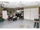 Well-lit garage with built-in storage, multiple outlets and ample open floor space at 6190 Sw 84Th Pl, Ocala, FL 34476