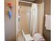 Shower with seating and grab bars, and decorative bird hangings at 6190 Sw 84Th Pl, Ocala, FL 34476