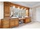 Bathroom featuring beautiful cabinetry, countertops, and an oversized mirror with vanity lighting at 7915 Se 12Th Cir, Ocala, FL 34480
