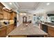 Spacious kitchen with large granite island, custom cabinets and stainless steel appliances at 7915 Se 12Th Cir, Ocala, FL 34480