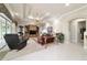 Relaxing living room featuring comfortable seating, natural light, and outdoor views at 7915 Se 12Th Cir, Ocala, FL 34480