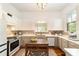 Updated kitchen featuring stainless steel appliances, countertops, ample cabinet space, and island at 828 Se 3Rd St, Ocala, FL 34471