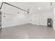 Spacious two car garage with ample storage and a water heater at 8456 Se 164Th Pl, Summerfield, FL 34491