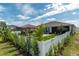 The backyard includes a screened porch, gazebo, and lush landscaping, offering a perfect blend of relaxation and entertainment at 9886 Sw 104Th Ave, Ocala, FL 34481