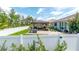 This backyard is fully enclosed with a white fence, creating a private outdoor oasis with a cozy gazebo seating area at 9886 Sw 104Th Ave, Ocala, FL 34481