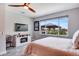 Relaxing bedroom featuring a modern ceiling fan, natural light, and a cozy ambiance at 9886 Sw 104Th Ave, Ocala, FL 34481