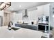 Bright and modern kitchen featuring stainless steel appliances and sleek countertops at 9886 Sw 104Th Ave, Ocala, FL 34481