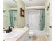 Bathroom featuring a shower and tub combo and a vanity with a black faucet at 106 Pine Trce, Ocala, FL 34472