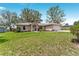 Charming one-story home with a well-maintained lawn and inviting curb appeal at 106 Pine Trce, Ocala, FL 34472