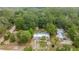 Aerial view of the home and surrounding lush greenery at 10671 Ne 152Nd Ln, Fort Mc Coy, FL 32134