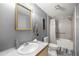 Neutral bathroom featuring a single sink vanity and a tub-shower combination at 10671 Ne 152Nd Ln, Fort Mc Coy, FL 32134