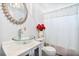 Modern bathroom with a unique glass sink and elegant fixtures, creating a spa-like atmosphere at 16082 Sw 24Th Pl, Ocala, FL 34481