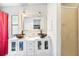 Modern bathroom boasts double vanities with vessel sinks plus a glass-enclosed shower stall at 16082 Sw 24Th Pl, Ocala, FL 34481