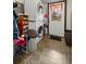 Laundry room featuring tile floors, a stackable washer and dryer and plenty of storage space at 22535 Sw 117Th St, Dunnellon, FL 34431