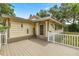 A charming backyard featuring a cozy deck with a privacy fence and peaceful surroundings at 22535 Sw 117Th St, Dunnellon, FL 34431