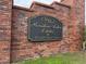 Brick sign reading 'Rainbow Lakes Estates Municipal Service District' in gold lettering at 23310 Sw Marine Blvd, Dunnellon, FL 34431