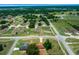 An aerial shot of the community, showcasing homes amongst trees at 263 Chestnut Rd, Ocala, FL 34480