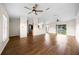 Spacious living room showcases hardwood floors, ceiling fans, and open layout at 263 Chestnut Rd, Ocala, FL 34480