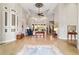 Expansive foyer featuring tile floors, high ceilings, and seamless access to the main living area at 3986 Se 43Rd Cir, Ocala, FL 34480