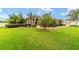Beautiful front yard with lush green grass and manicured landscaping at 3986 Se 43Rd Cir, Ocala, FL 34480
