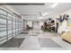 Spacious garage with painted floors and ample storage space at 3986 Se 43Rd Cir, Ocala, FL 34480