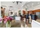 Well-lit kitchen featuring pendant lights, breakfast bar, tile backsplash, and stainless steel appliances at 3986 Se 43Rd Cir, Ocala, FL 34480