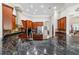 Kitchen featuring granite counters, cherry wood cabinets, and stainless-steel appliances at 3986 Se 43Rd Cir, Ocala, FL 34480