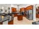 Updated kitchen with custom cabinets, modern appliances, and center island at 3986 Se 43Rd Cir, Ocala, FL 34480