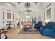 Inviting living room featuring neutral tones and detailed ceilings with plenty of space at 3986 Se 43Rd Cir, Ocala, FL 34480