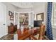 Well-lit home office featuring a large desk, and lots of natural light at 3986 Se 43Rd Cir, Ocala, FL 34480