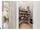 Pantry with shelving, providing ample storage for kitchen necessities at 3986 Se 43Rd Cir, Ocala, FL 34480