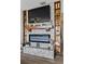 Decorative fireplace with built in bookshelves and mantel at 460 E Haines Blvd, Lake Alfred, FL 33850